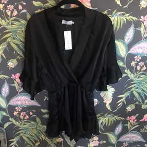 Lioness meet me in como black silk romper NWT